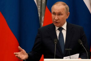 FILE PHOTO: Russian President Vladimir Putin meets with French President Emmanuel Macron in Moscow